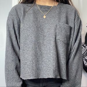 Long sleeve shirt with pocket.